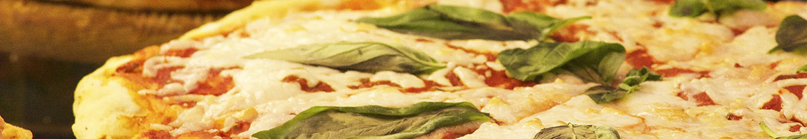 Eating Pizza at Exlines' Best Pizza In Town restaurant in Memphis, TN.